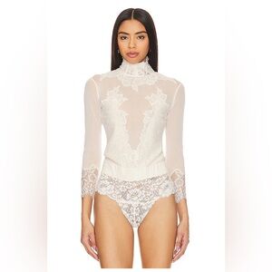 Take A Bow Reversible Bodysuit in Noir Combo
HAH NWT size S